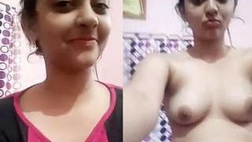 Indian beauty fondles her breasts in solo performance