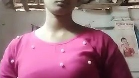 Village bhabi displays her large breasts in a sensual video