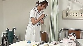 Sensual nurse Reiko Sawamura disappears into the background