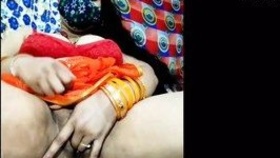 Indian housewives' webcam performance featuring lubricated vaginas and oil massage