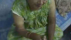 Desi Bhabhi pleasures herself in rural setting