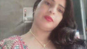Indian mature woman engages in sexual activity on camera