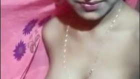 Indian village woman reveals her breasts