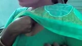 Indian mature woman's breasts fondled and groped by dominant man