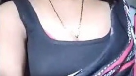 Bhabhi revealing her voluptuous breasts in an enticing way