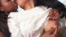 Sensual ebonies kissing and sucking big boobs