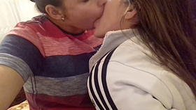 Horny lesbians indulge in deep kissing and oral stimulation