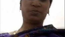 Indian matron displays her breasts during a video chat