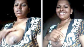 Aunty flaunts her large natural breasts to neighbors