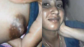 Indian teenage girl displays her breasts and vagina