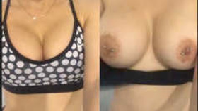 Desi girl proudly displays her ample bosom in a sultry recording