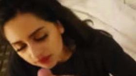 An Indian wife gives her husband a passionate oral sex session in bed