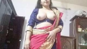 Indian momo with adorable charm bares her breasts