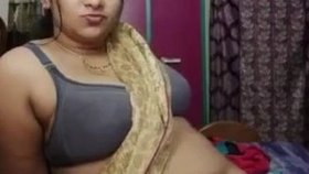 Desi beauty dances with voluptuous breasts