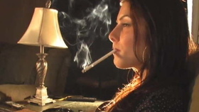American Lisa enjoys a cigarette