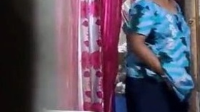 Indian aunty undresses for a passionate rendezvous
