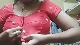 Indian college girl wears pink bra and red top on camera in her bedroom