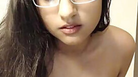 Indian wife plays with glasses adores nothing better than porn posing on webcam
