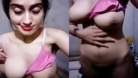 Busty girl jerking off her pussy in the bathroom