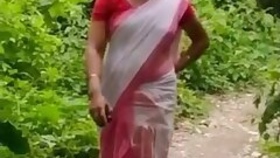 Assamee Budi Licking her Lover's Pussy in the Jungle
