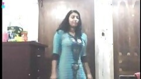 Bengali girl in chalvet costume undressing and trying on dresses
