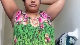 Aunt Desi's unbuttoning her dress