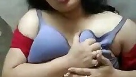 Extremely horny Bhabhi presses her tits against her hubby