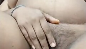 South Indian bhabhi shows off her wet pussy with her cum